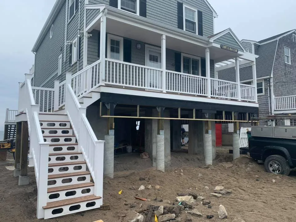 Elevated home with new stairs and landings