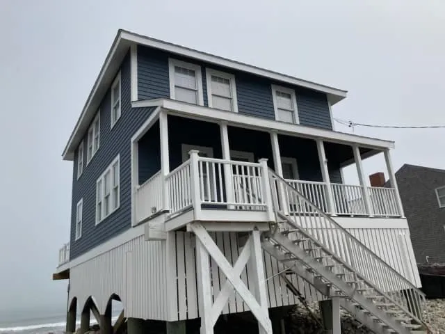 House elevation lifting in progress