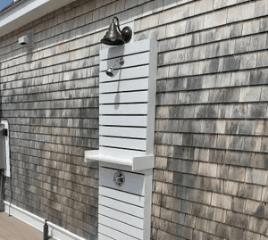 Exterior siding and trim detail on a renovated South Shore home